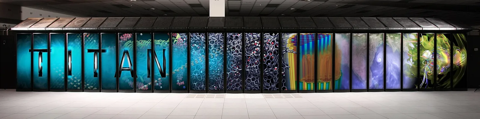 The Titan supercomputer, a long row of cabinets with vivid printed panels